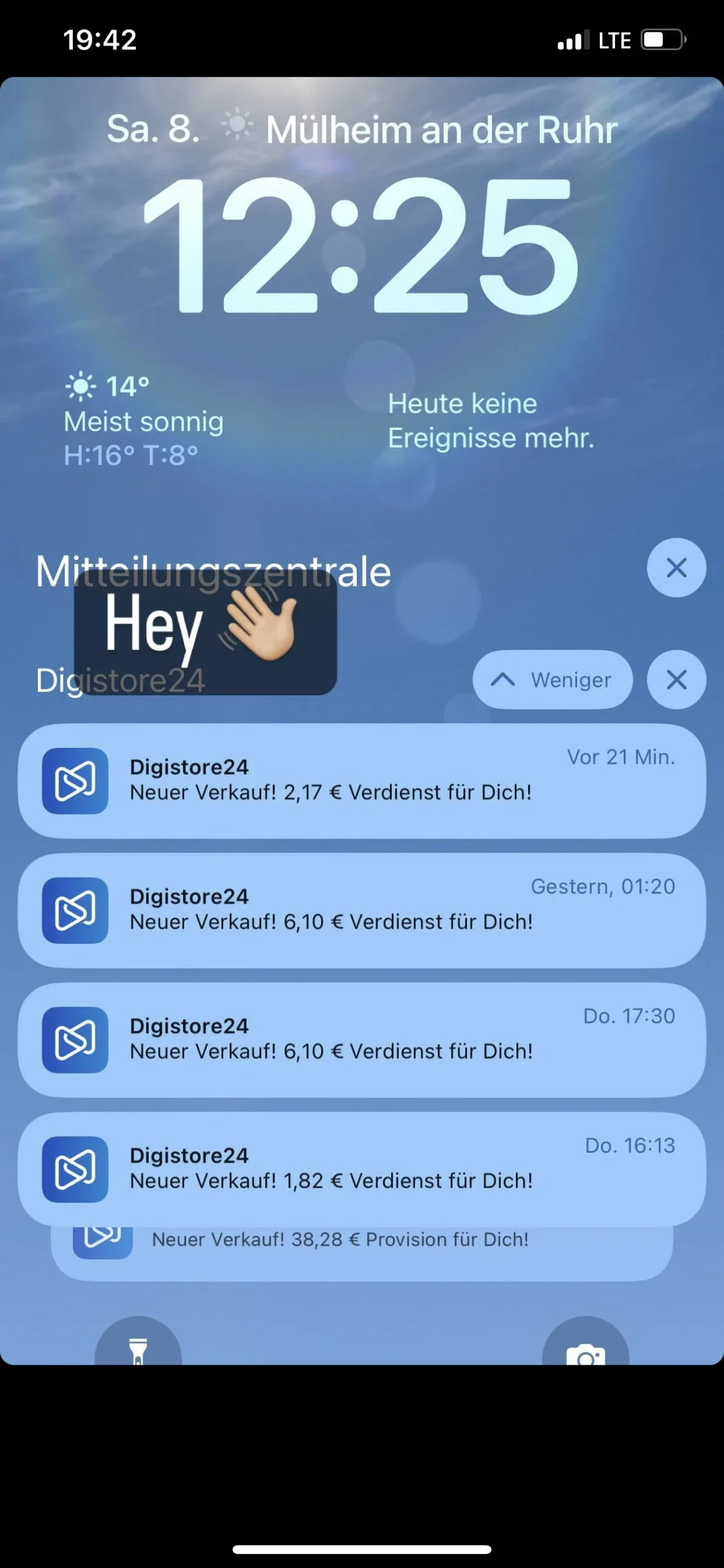 iPhone-Lockscreen mit sonnigem Wetterhintergrund und Ilias Marketing Icon Gold