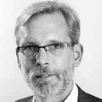 Andreas Oligschlaeger, Mann mit Brille und grauem Haar