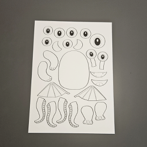 Ausmalbild zum Bau deines eigenen Monsters mit großer Mittelform und verschiedenen Körperteilen
