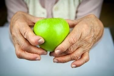 Apfel mit Rheuma-Gelenk-Illustration