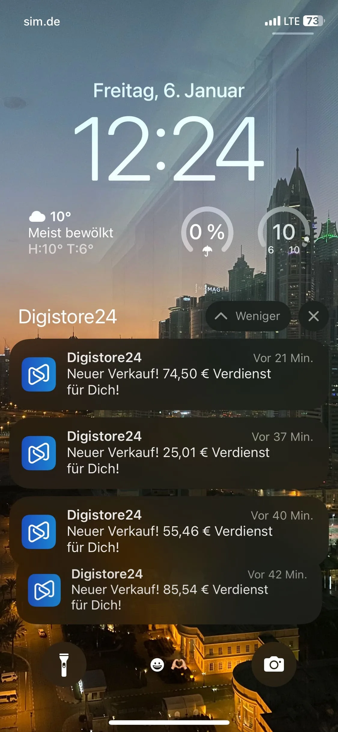 iPhone-Lockscreen Freitag 6. Januar 12:24 Uhr mit sim.de, Wetter 10° meist bewölkt, Digistore24 Verkaufs-Provisionen 74,50€ u
