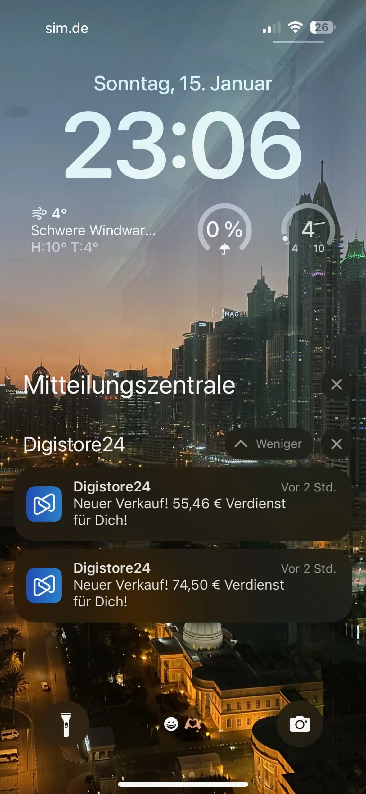 iPhone-Lockscreen Sonntag 15. Januar 23:06 Uhr mit sim.de WLAN, Wetter 4° Schwere Windwarnung 0%, Digistore24 Provisionen 55,