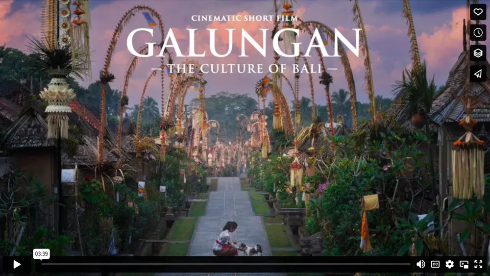 Standbild aus Galungan Kurzfilm mit balinese Tempel-Allee und Video-Player-Bedienleiste