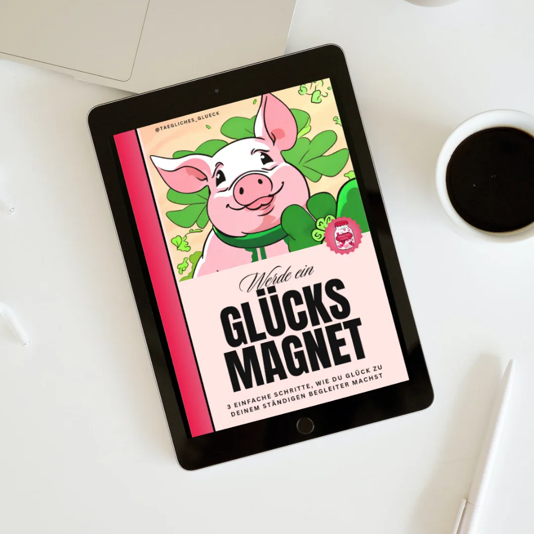 E-Book Glücksmagnet auf Tablet-Display mit Schwein-Illustration und Kleeblättern