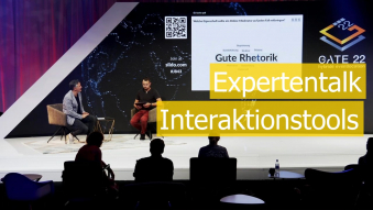 Expertentalk auf Bühne mit Text Interaktionstools