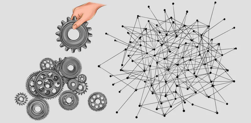 Hand nimmt Zahnrad, darunter mehrere Zahnräder und Netzwerk-Knoten