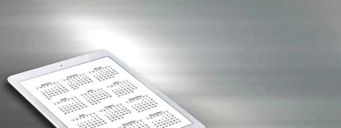 Kalender 2026 auf Tablet-Bildschirm angezeigt