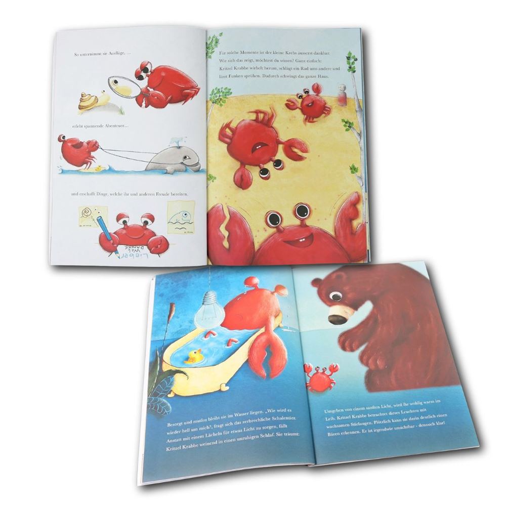 Kritzel Krabbe Buch mit aufgeschlagenen Seiten zeigt Geschichte der Krabbe, Illustrationen und Selbstbewusstsein-Inhalte