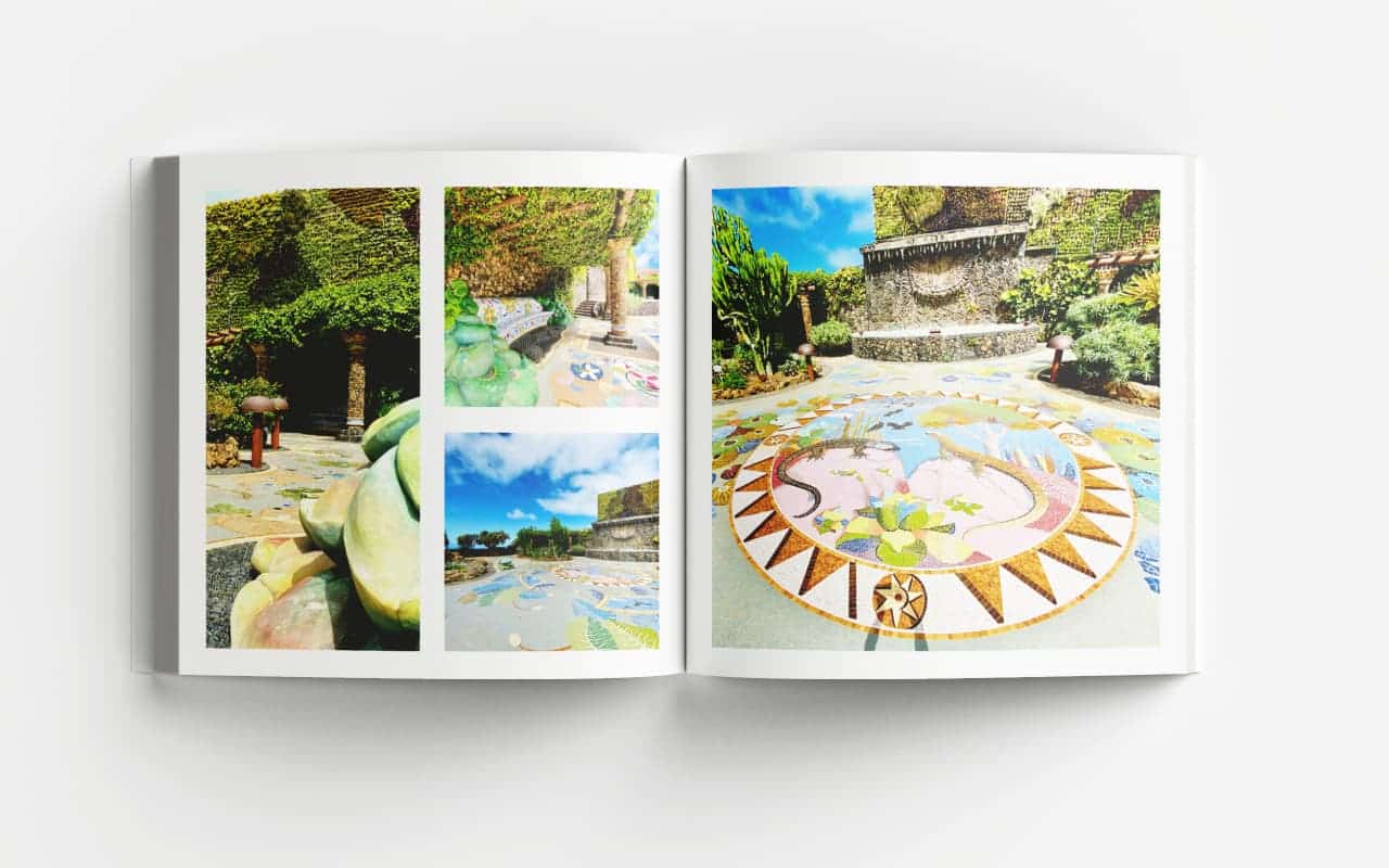 Aufgeschlagener La Palma Bildband mit sechs verschiedenen Fotos von Kunstobjekten und Wandmalereien in grüner Umgebung und au
