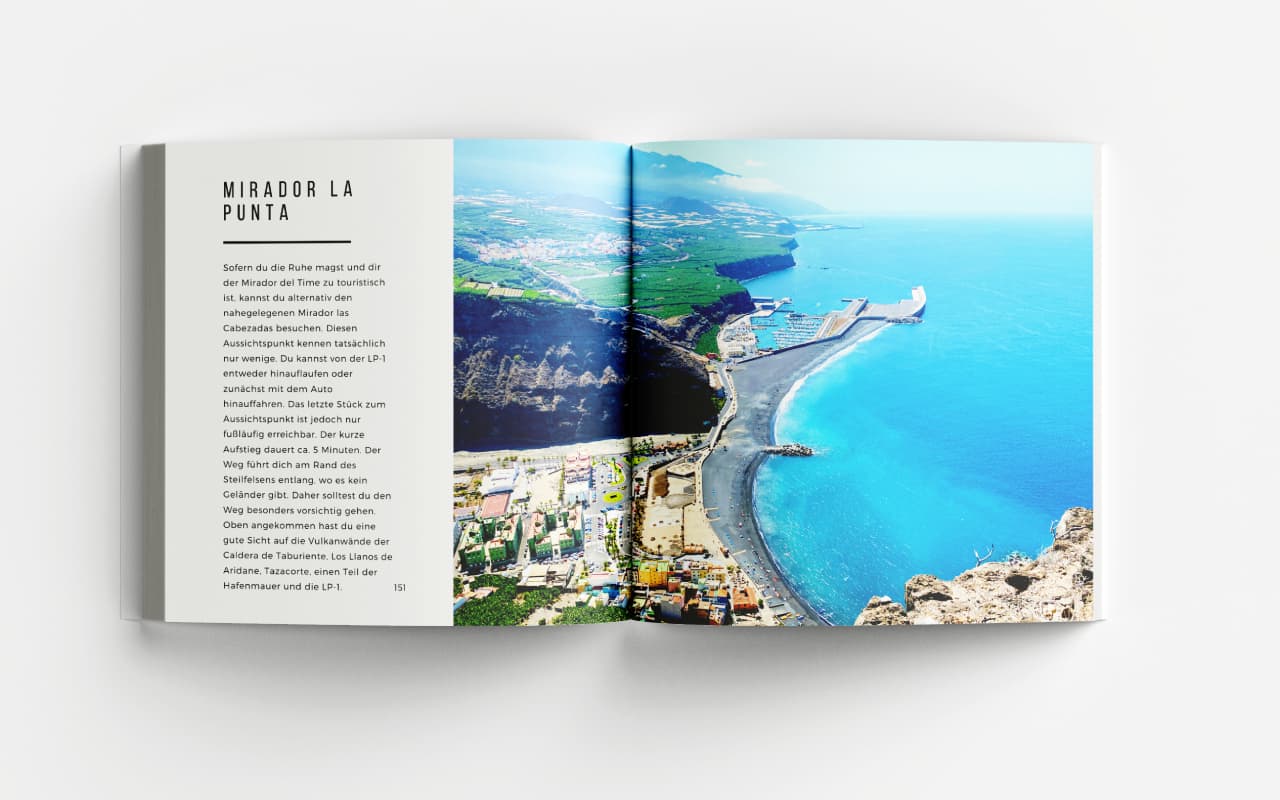 Aufgeschlagener La Palma Bildband Seite 'MIRADOR LA PUNTA' mit Text und großformatigem Foto einer Insellandschaft von oben mi
