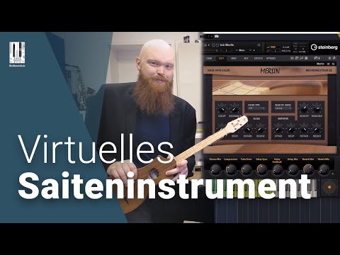 Musikproduzent mit Gitarre zeigt virtuelles Saiteninstrument in Software