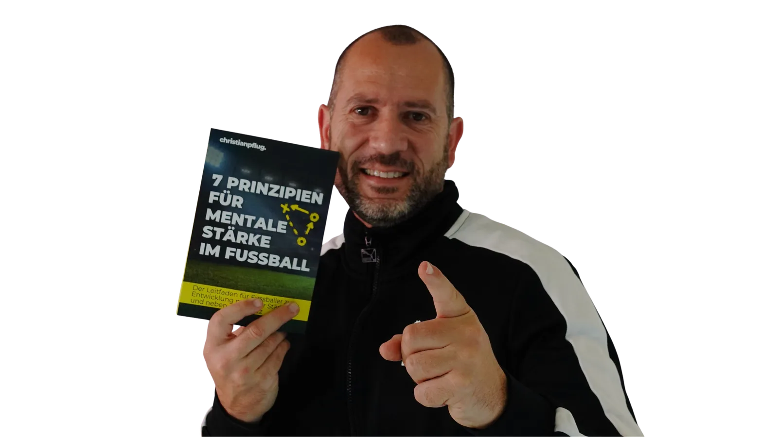 Christian Pflug hält sein Buch mit 7 Prinzipien für mentale Stärke im Fußball