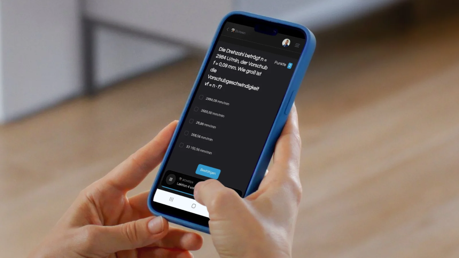 MyDigiAcademy – Lernapp zur IHK-Prüfung von Florian Honold 5 Smartphone mit Wissenscheck-Quiz zur Drehzahlberechnung einer Schleifscheibe