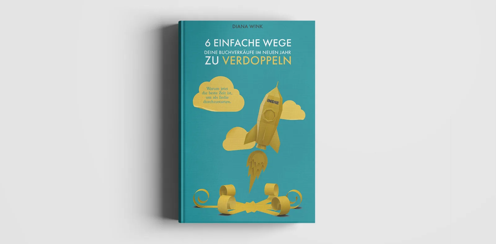 Buchcover-Mockup: Türkisblaues Cover mit goldener Rakete und Wolken, Titel in Weiß und Gold