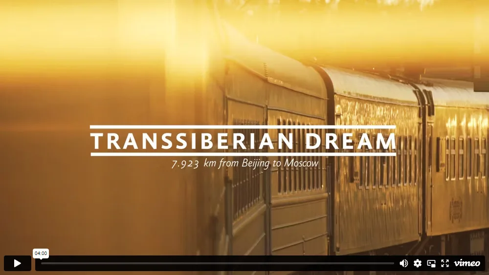 Videoplayer mit Zugwaggon bei Sonnenaufgang und Transsiberian Dream Titeln