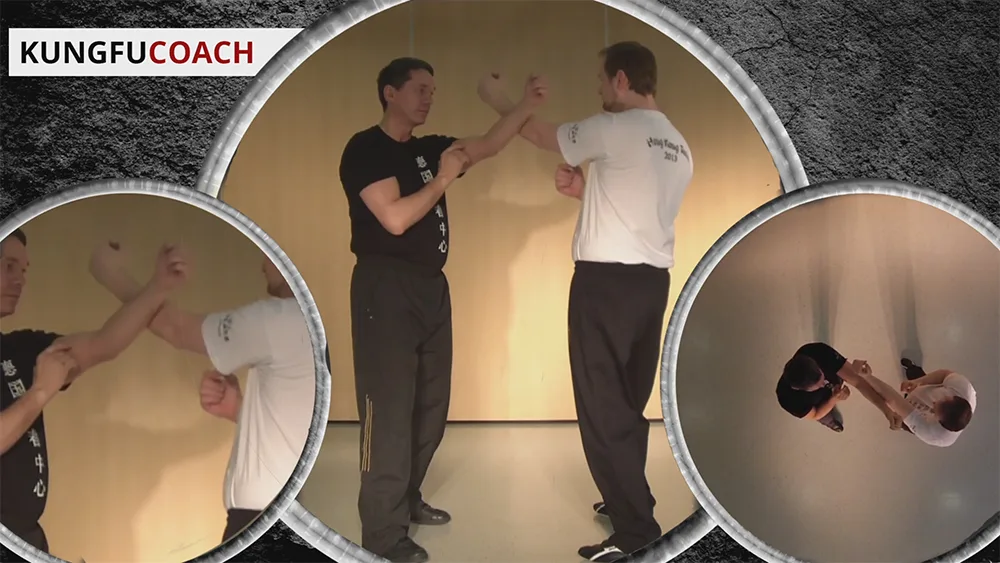 Wing Chun Kung Fu Partnerübung: Trainer und Schüler trainieren Abwehr- und Angriffstechniken