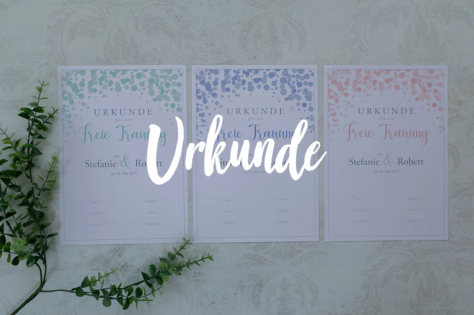 Drei Urkunden für Freie Trauung in verschiedenen Farben (Grün, Blau, Rosa) mit Konfetti-Design