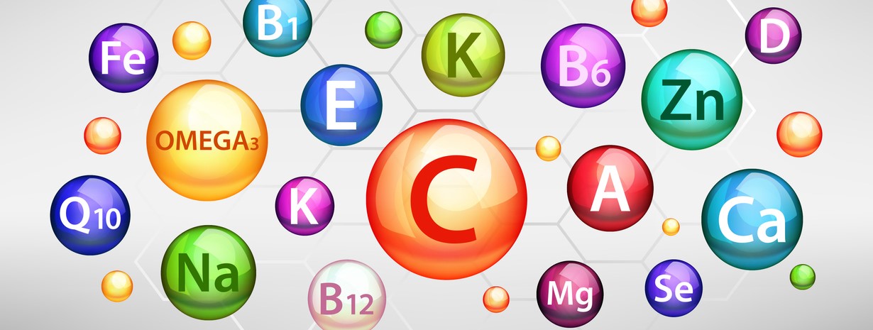 Chronisch gesund mit Vitalstoffpower – Videokurs über Vitalstoffe 2 Vitalstoffe und Mineralstoffe als bunte Kugeln mit Beschriftungen wie Vitamin B1, Omega-3, Vitamin C, Zink, Magnesium