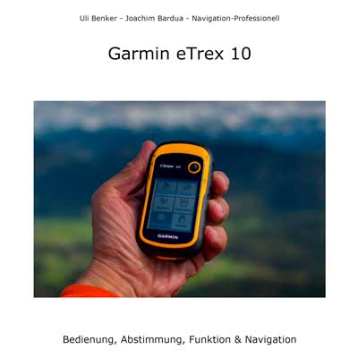 Garmin eTrex 10 orange-schwarzes GPS-Navigationsgerät in Hand vor Bergkulisse