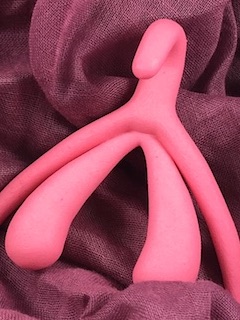 3D-Klitoris Stoffmodell in Pink auf lila Stoff