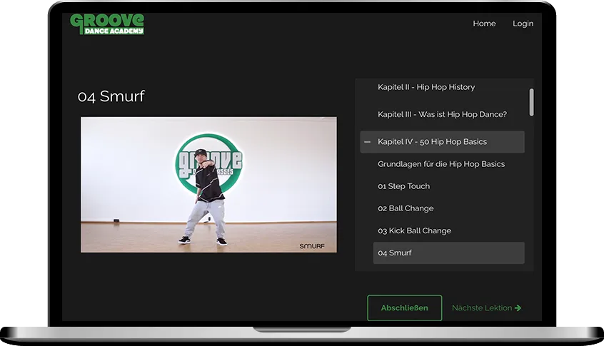 Hip Hop Basics – Hip-Hop-Tanzkurs per Video 4 Screenshot des Hip Hop Basics Programms auf MacBook, zeigt Smurf-Tanzschritt mit Groove Dance Academy Logo