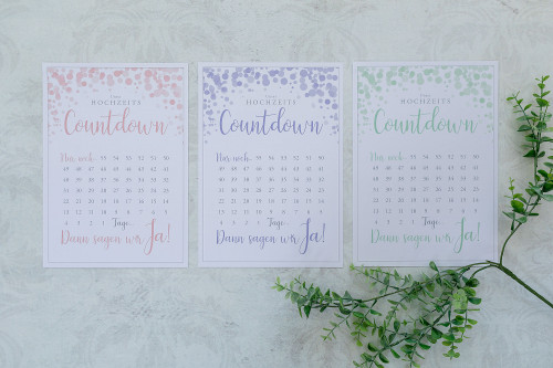 Hochzeits-Countdown – Paket zur Hochzeitsplanung 2 Countdown-Kalender mit drei Farbvarianten Rosa, Blau und Grün nebeneinander