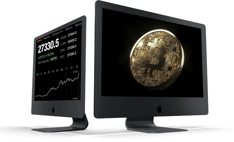 Zwei iMac-Monitore zeigen Bitcoin-Kurschart und goldene Bitcoin-Münze