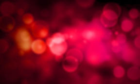 Abstraktes Bokeh-Hintergrundbild in Pink-, Rot- und Orangetönen