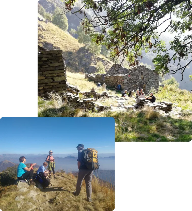 Wandergruppe bei Rast in Berglandschaft mit Ruinen, Personen mit Rucksäcken