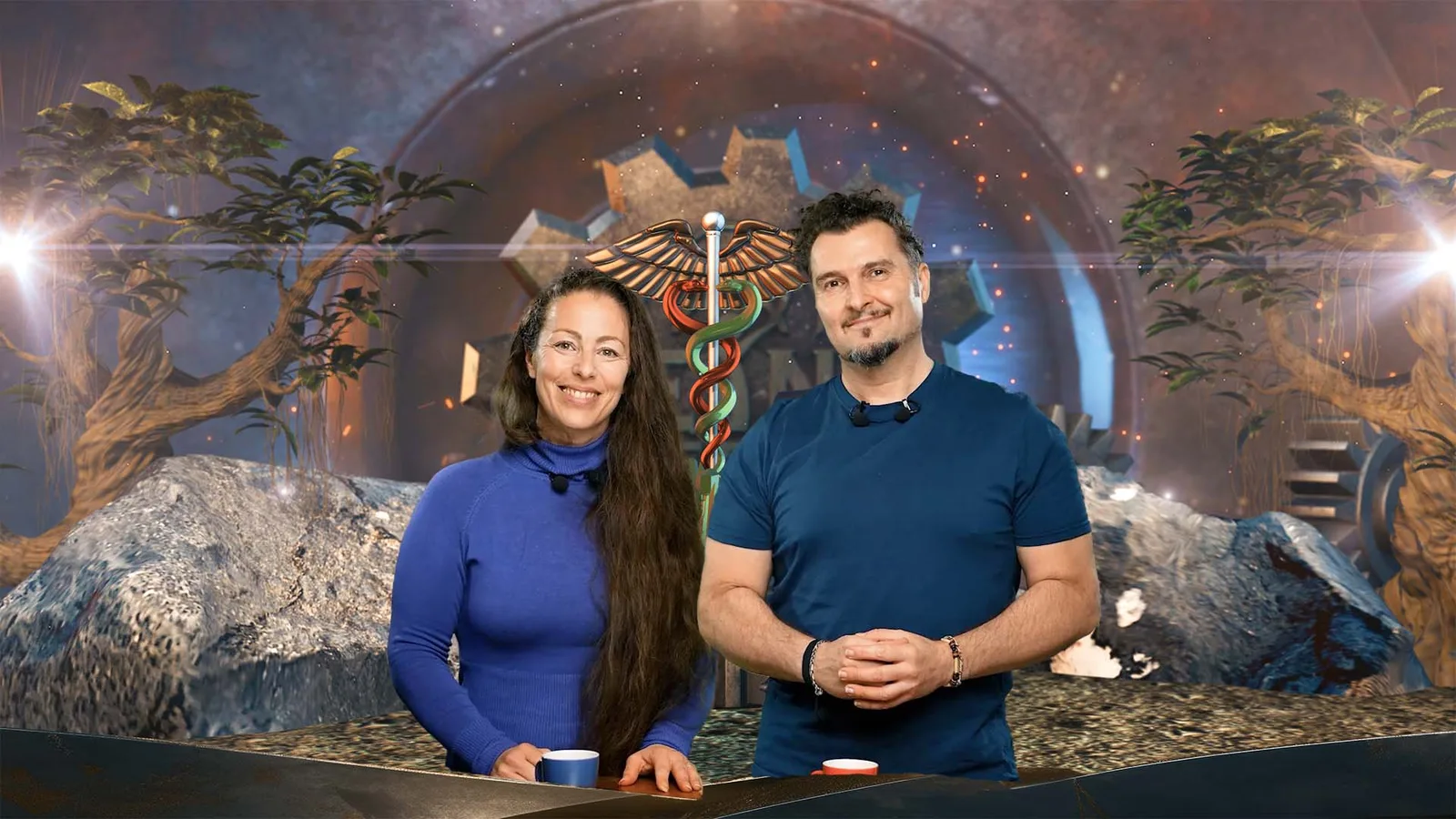 Seinskraftwerk® – Videokurs zur Selbsterkenntnis von Verena Liesegang 6 Verena und Claudio vor mystischem Studio-Set mit Heilstab und Pflanzen