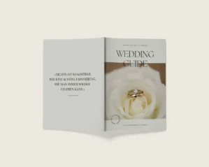Wedding Guide Design-Vorlage als aufgeschlagenes Magazin mit Ringdesign auf weißer Rose